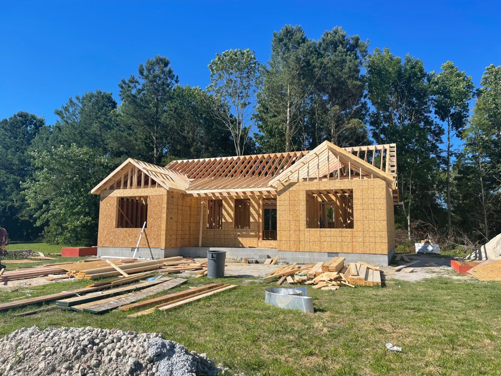 Wood framing of a custom home by Above All Construction