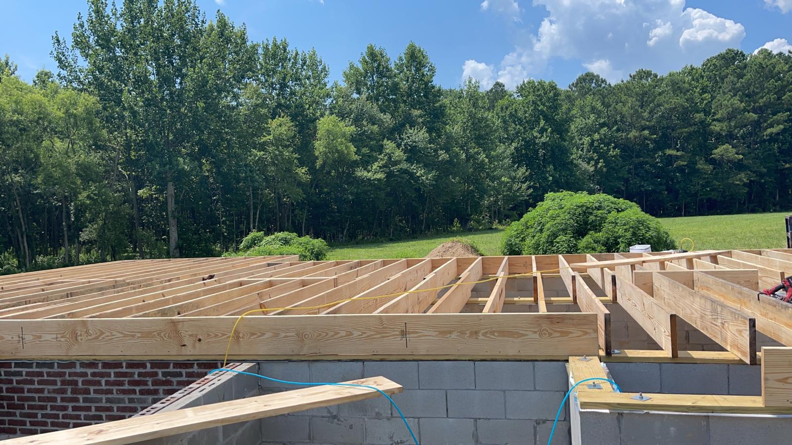 Wood framing on the foundation for a custom home in Princess Anne, MD